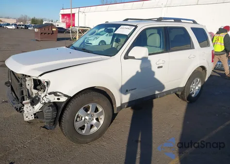 2009 Ford Escape Hybrid Limited из США, поврежденный, VIN 1FMCU49349KA56042